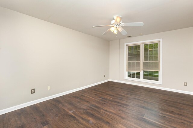 2600 Sunningdale Pl E, La Grange, KY 40031 - empty room featuring baseboards, dark wood-style floors, and ceiling fan