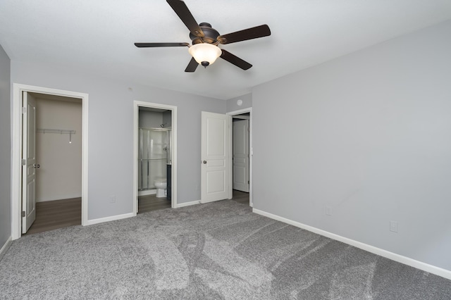 2387 Ambrato Way Unit 2-307, Covington, KY 41017 - unfurnished bedroom featuring carpet, baseboards, a walk in closet, connected bathroom, and a ceiling fan