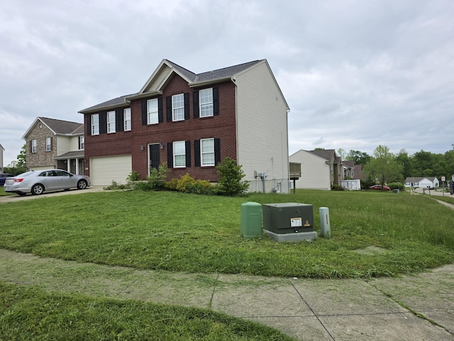 2964 Holly Hill Dr, Burlington, KY 41005 - view of front of home featuring an attached garage, brick siding, driveway, and a front yard