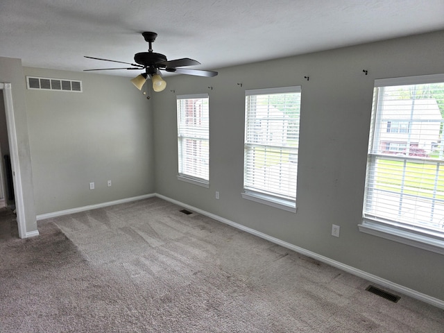 2964 Holly Hill Dr, Burlington, KY 41005 - carpeted spare room with baseboards, a ceiling fan, and visible vents