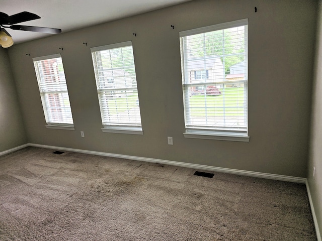 2964 Holly Hill Dr, Burlington, KY 41005 - carpeted empty room featuring a ceiling fan, baseboards, and visible vents