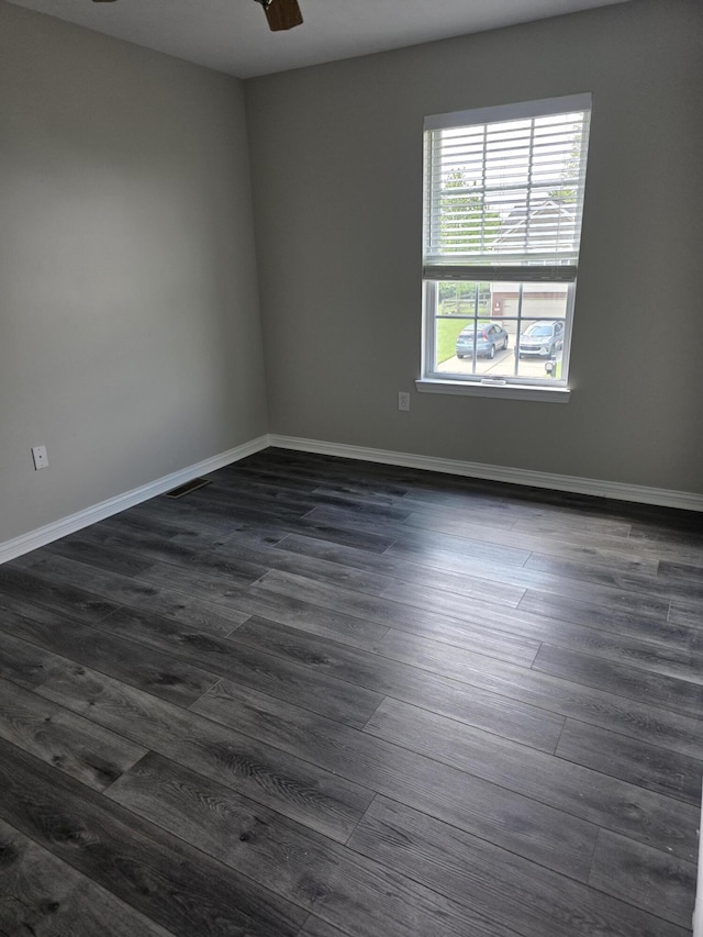 2964 Holly Hill Dr, Burlington, KY 41005 - empty room with dark wood-style flooring, baseboards, and ceiling fan