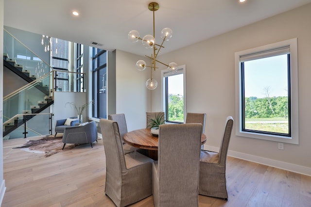 1200 Vistapointe Dr, Covington, KY 41011 - dining area featuring plenty of natural light, stairway, light wood-style flooring, and recessed lighting