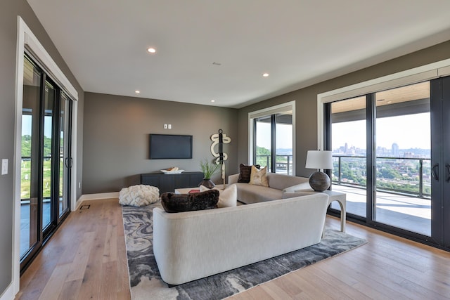 1200 Vistapointe Dr, Covington, KY 41011 - living room featuring light wood-style flooring and recessed lighting