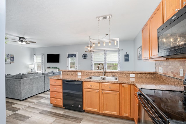 47 Nicole Dr, Independence, KY 41051 - kitchen featuring black appliances, a sink, healthy amount of natural light, and a peninsula