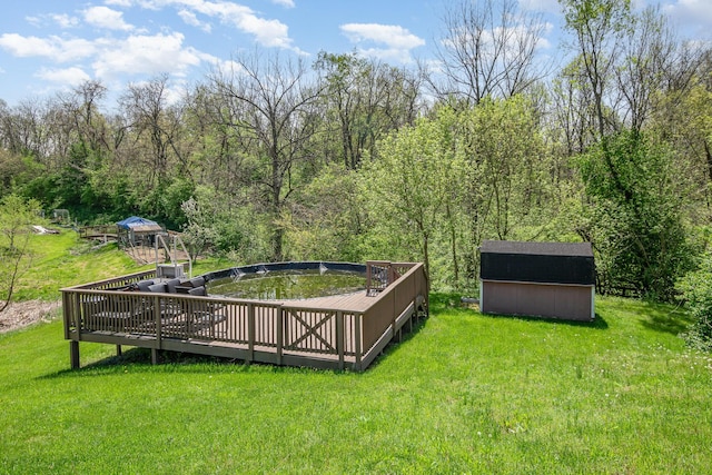 47 Nicole Dr, Independence, KY 41051 - view of grassy yard with a storage shed, a wooden deck, and an outdoor structure