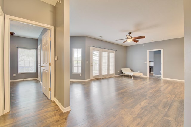 517 Ivy Ridge Dr, Cold Spring, KY 41076 - unfurnished living room with a ceiling fan, wood finished floors, and baseboards