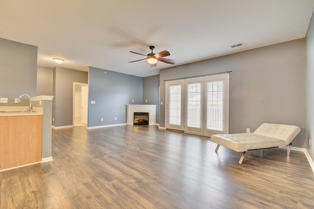 517 Ivy Ridge Dr, Cold Spring, KY 41076 - living area featuring ceiling fan, a fireplace, and wood finished floors