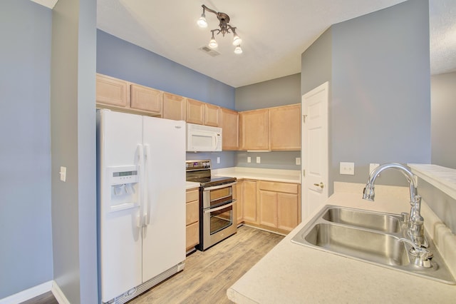 517 Ivy Ridge Dr, Cold Spring, KY 41076 - kitchen featuring white appliances, light brown cabinets, a sink, light wood-style flooring, and light countertops