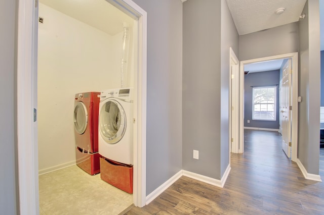 517 Ivy Ridge Dr, Cold Spring, KY 41076 - washroom featuring washing machine and clothes dryer, baseboards, and wood finished floors