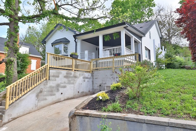 view of front of property with stairway
