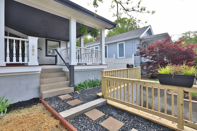 wooden terrace featuring a porch
