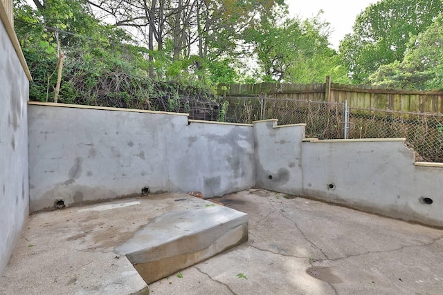 view of patio with fence