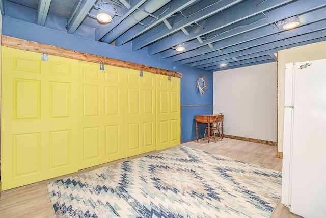 850 Stablewatch Dr, Independence, KY 41051 - below grade area with wood finished floors and freestanding refrigerator