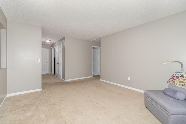 850 Stablewatch Dr, Independence, KY 41051 - sitting room featuring carpet floors, baseboards, and a textured ceiling