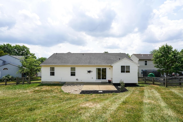 back of house with a patio and a shingled roof