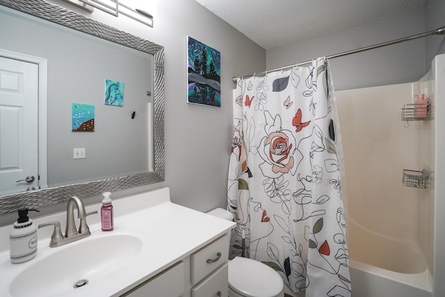 bathroom with toilet, vanity, and shower / bath combination with curtain