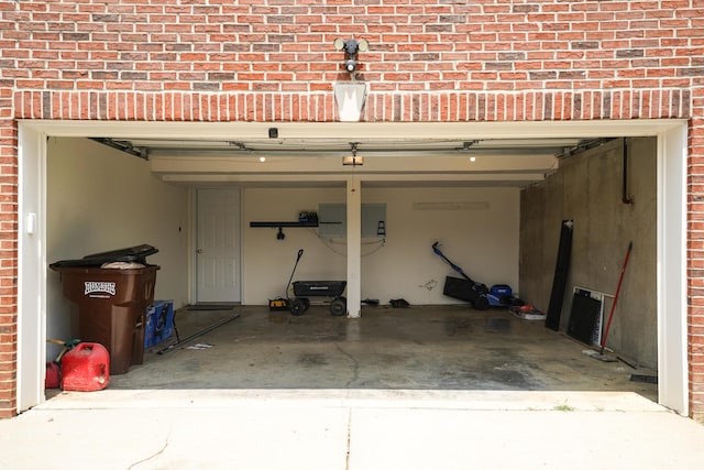 garage featuring driveway