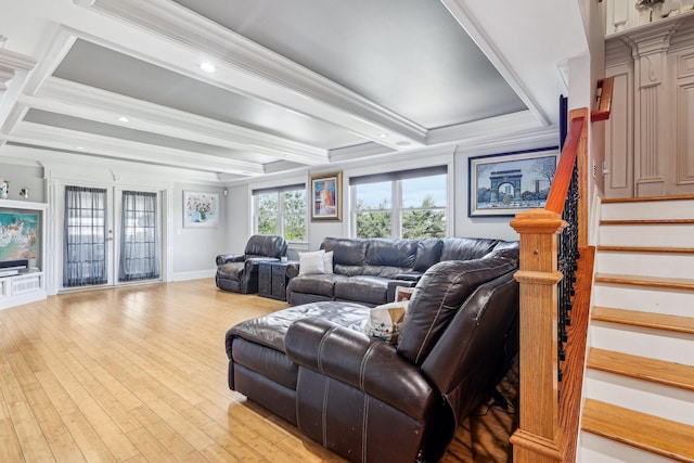 214 Clifton Ave, Newport, KY 41071 - living area with stairway, ornamental molding, light wood-type flooring, beam ceiling, and french doors