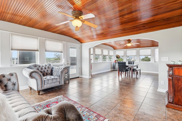 214 Clifton Ave, Newport, KY 41071 - tiled living room with ceiling fan, wooden ceiling, lofted ceiling, arched walkways, and baseboards