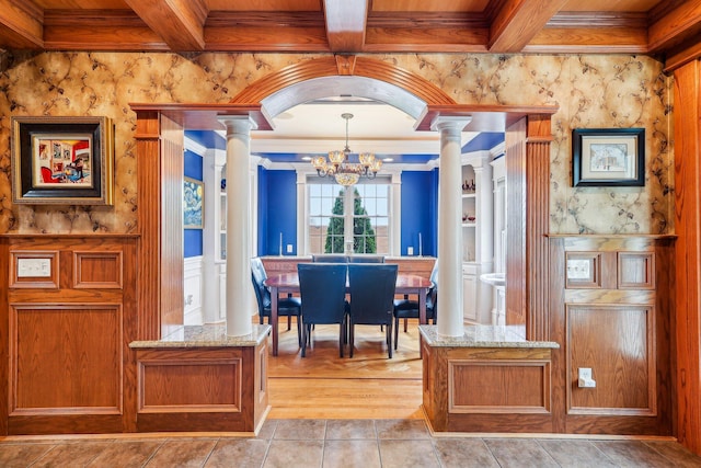 214 Clifton Ave, Newport, KY 41071 - dining area with a chandelier, decorative columns, ornamental molding, wood ceiling, and beamed ceiling