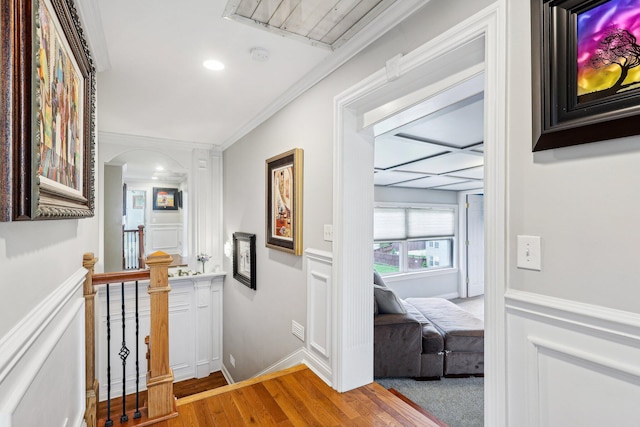214 Clifton Ave, Newport, KY 41071 - corridor with an upstairs landing, wood finished floors, arched walkways, recessed lighting, and crown molding