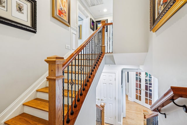 214 Clifton Ave, Newport, KY 41071 - stairs with wood finished floors, attic access, baseboards, recessed lighting, and a towering ceiling