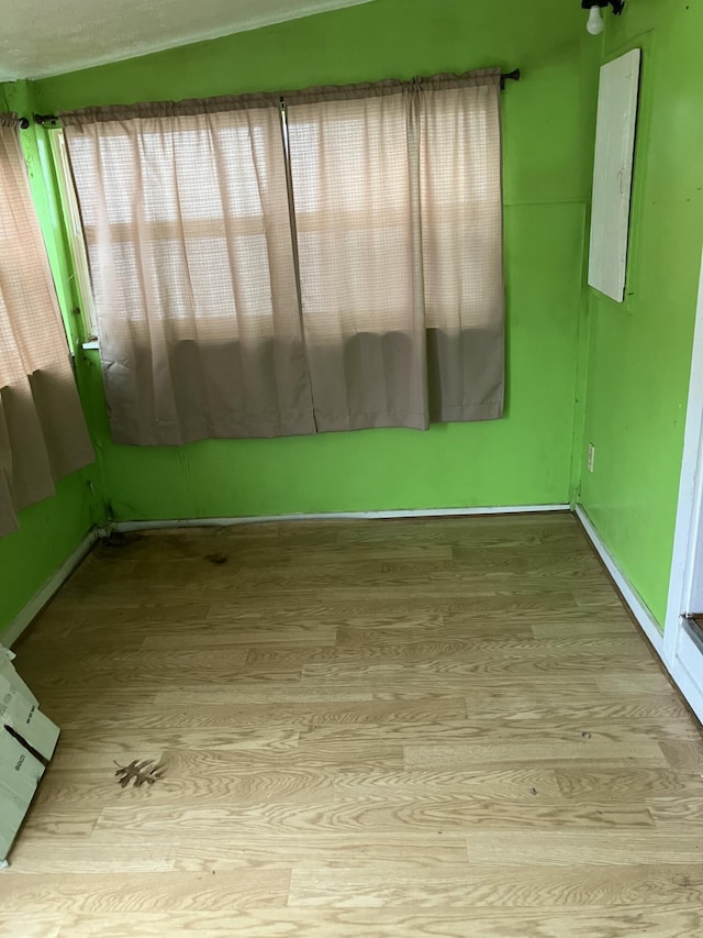 4910 Fowler Creek Rd, Covington, KY 41017 - spare room featuring wood finished floors and baseboards