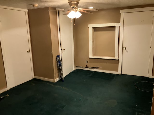 4910 Fowler Creek Rd, Covington, KY 41017 - unfurnished bedroom featuring carpet flooring, a textured ceiling, and baseboards