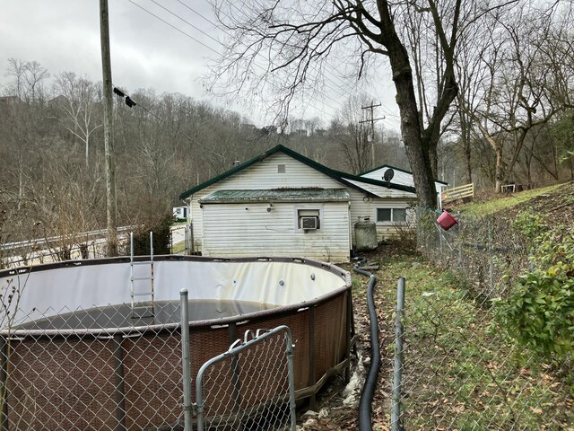 4910 Fowler Creek Rd, Covington, KY 41017 - rear view of house with fence