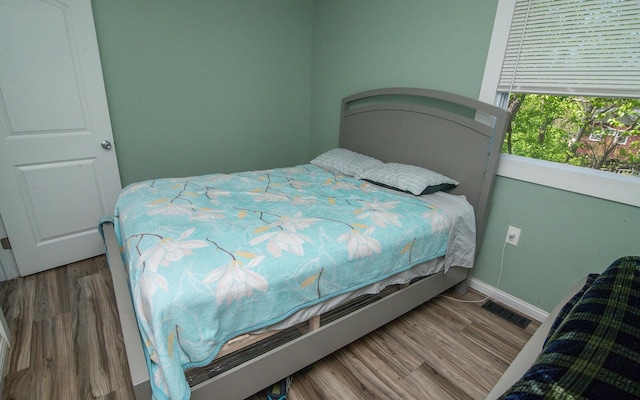 516 Buckner St, Elsmere, KY 41018 - bedroom featuring baseboards and wood finished floors