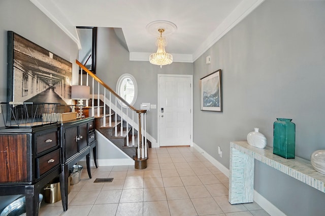 516 Western Ave, Covington, KY 41011 - tiled foyer entrance with stairs, a chandelier, baseboards, and crown molding