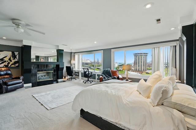 516 Western Ave, Covington, KY 41011 - carpeted bedroom featuring a tile fireplace, a city view, and recessed lighting
