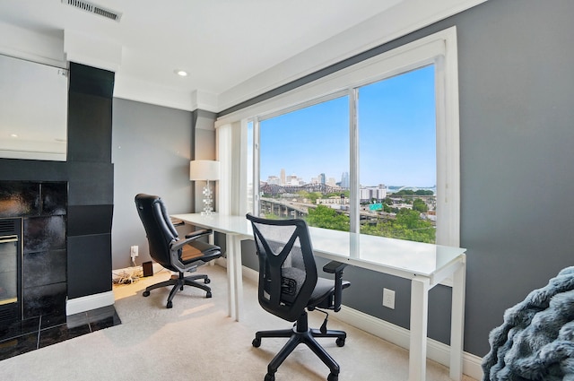 516 Western Ave, Covington, KY 41011 - carpeted home office featuring a city view, a tiled fireplace, baseboards, and recessed lighting