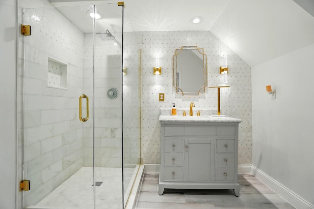 516 Western Ave, Covington, KY 41011 - bathroom featuring baseboards, a shower stall, vanity, and vaulted ceiling