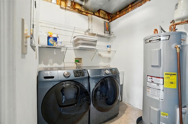 516 Western Ave, Covington, KY 41011 - laundry area featuring water heater and separate washer and dryer