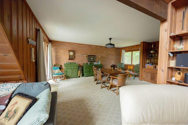 bedroom featuring a wood stove and carpet floors