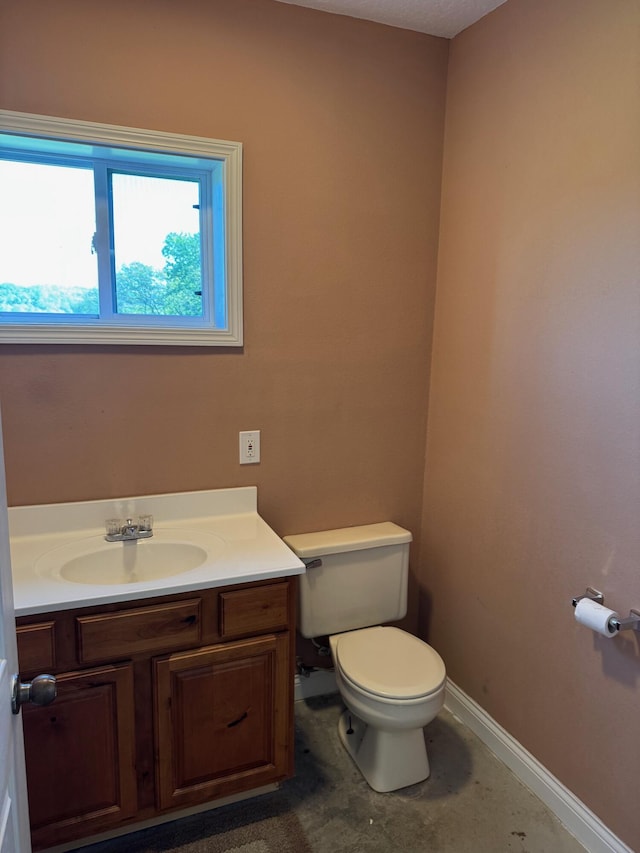 410 Links View Dr, Butler, KY 41006 - half bathroom featuring toilet, baseboards, and vanity