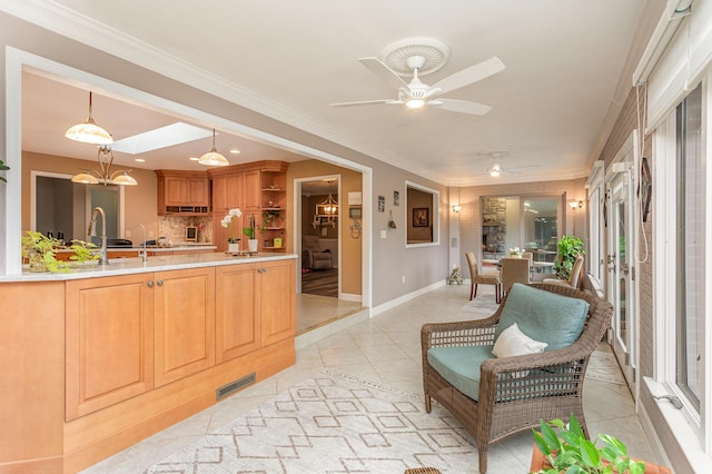 1051 Arden Dr, Villa Hills, KY 41017 - kitchen featuring light countertops, open shelves, ceiling fan, crown molding, and baseboards