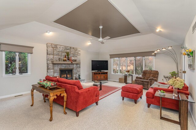 1051 Arden Dr, Villa Hills, KY 41017 - living area featuring ceiling fan, a stone fireplace, baseboards, and lofted ceiling