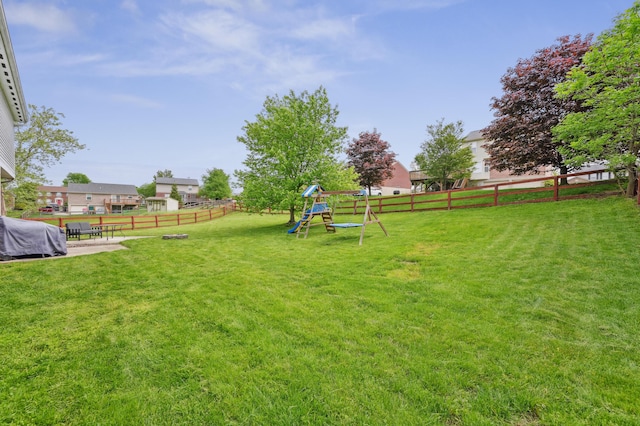 view of yard with a playground