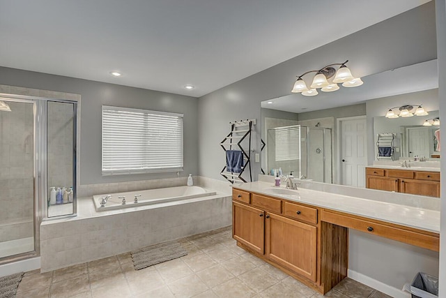 2282 Treetop Ln, Hebron, KY 41048 - bathroom featuring a shower stall, a garden tub, tile patterned floors, and vanity