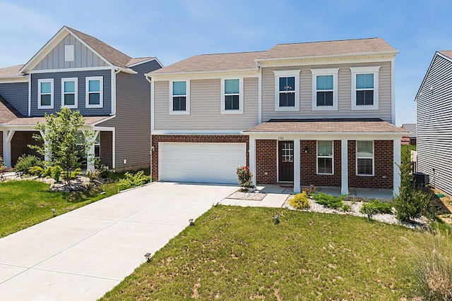 1782 Autumn Maple Dr, Independence, KY 41051 - view of front of house with brick siding, a garage, a porch, and concrete driveway