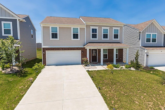 1782 Autumn Maple Dr, Independence, KY 41051 - view of front facade featuring a garage, brick siding, covered porch, and driveway