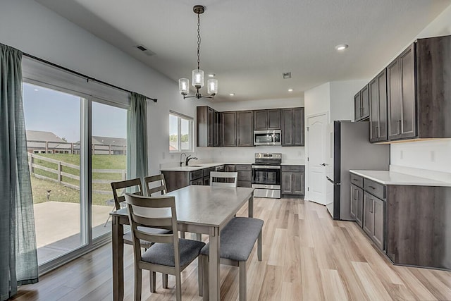1782 Autumn Maple Dr, Independence, KY 41051 - dining space featuring a chandelier, light wood finished floors, and recessed lighting