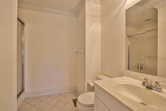 bathroom featuring ornamental molding, tile patterned floors, toilet, a shower with door, and vanity