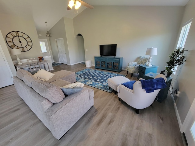6403 Arabian Dr, Independence, KY 41051 - living area featuring plenty of natural light, baseboards, wood finished floors, high vaulted ceiling, and ceiling fan