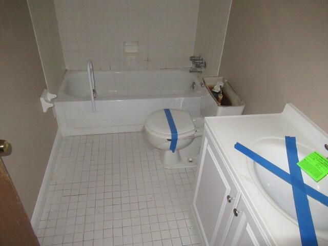 1101 Plateau St, Elsmere, KY 41018 - bathroom with tile patterned floors, vanity, and toilet