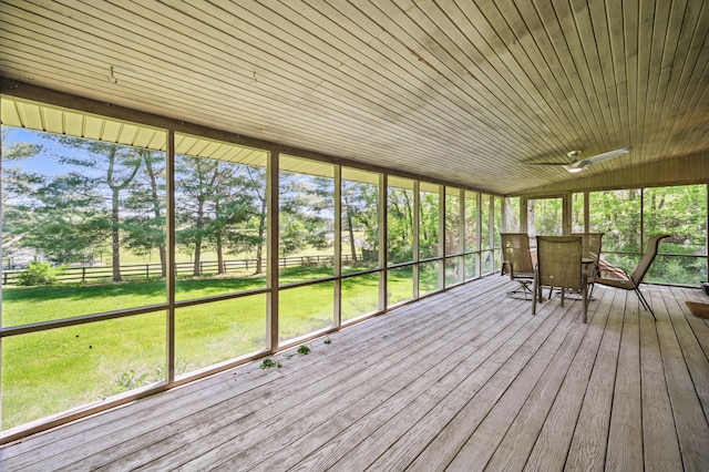 sunroom with outdoor dining space