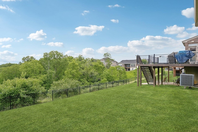 574 Ravensridge Ct, Alexandria, KY 41001 - view of yard featuring stairs, a wooden deck, and central air condition unit
